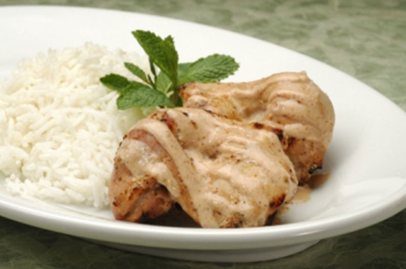 Tandoori Chicken served with basmati rice or seven-grain pilaf