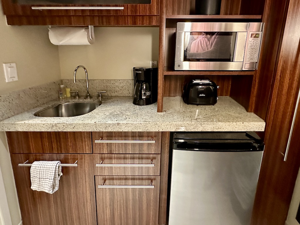 Kitchenette with sink, microwave, refrigerator