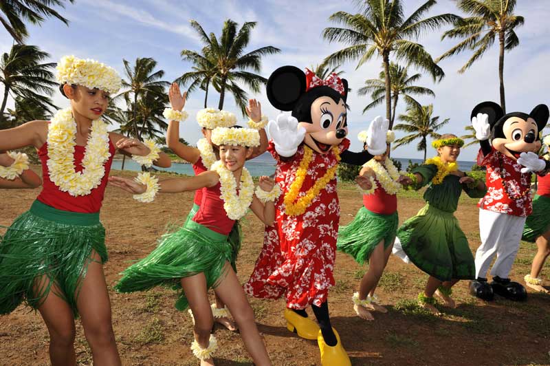 Local Oahu children teach Minnie and Mickey the aloha spirit through hula.