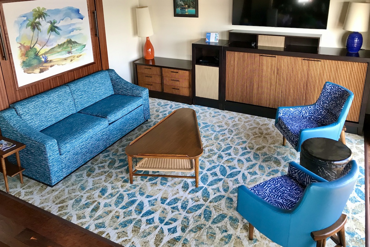 Bungalow living room with queen Murphy bed and twin sleeper under TV