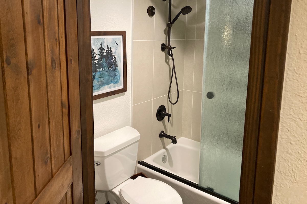 Bathroom tub and shower, commode